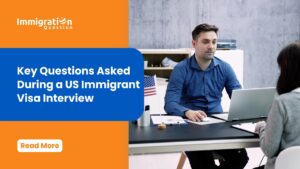 A man in a professional setting conducting an interview with a woman, with the Immigration Question logo and a headline stating 'Key Questions Asked During a US Immigrant Visa Interview.