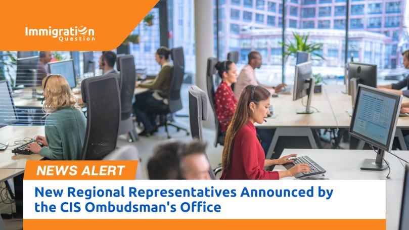 People working at desks in an office setting, with the Immigration Question logo and a news alert banner stating 'New Regional Representatives Announced by the CIS Ombudsman's Office.'